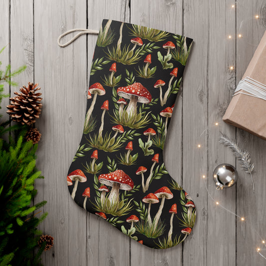 amanita muscaria holiday stocking with a black background