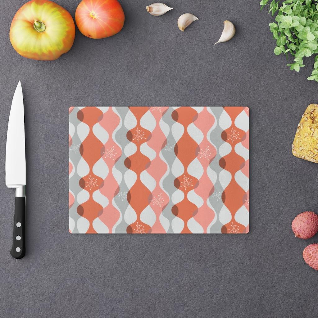 Mid Century Mod Atomic Bursts & Waves Pink Glass Cutting Board | lovevisionkarma.com
