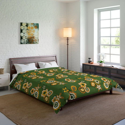 comforter featuring retro mod flowers in shades of green and mustard against a retro green background