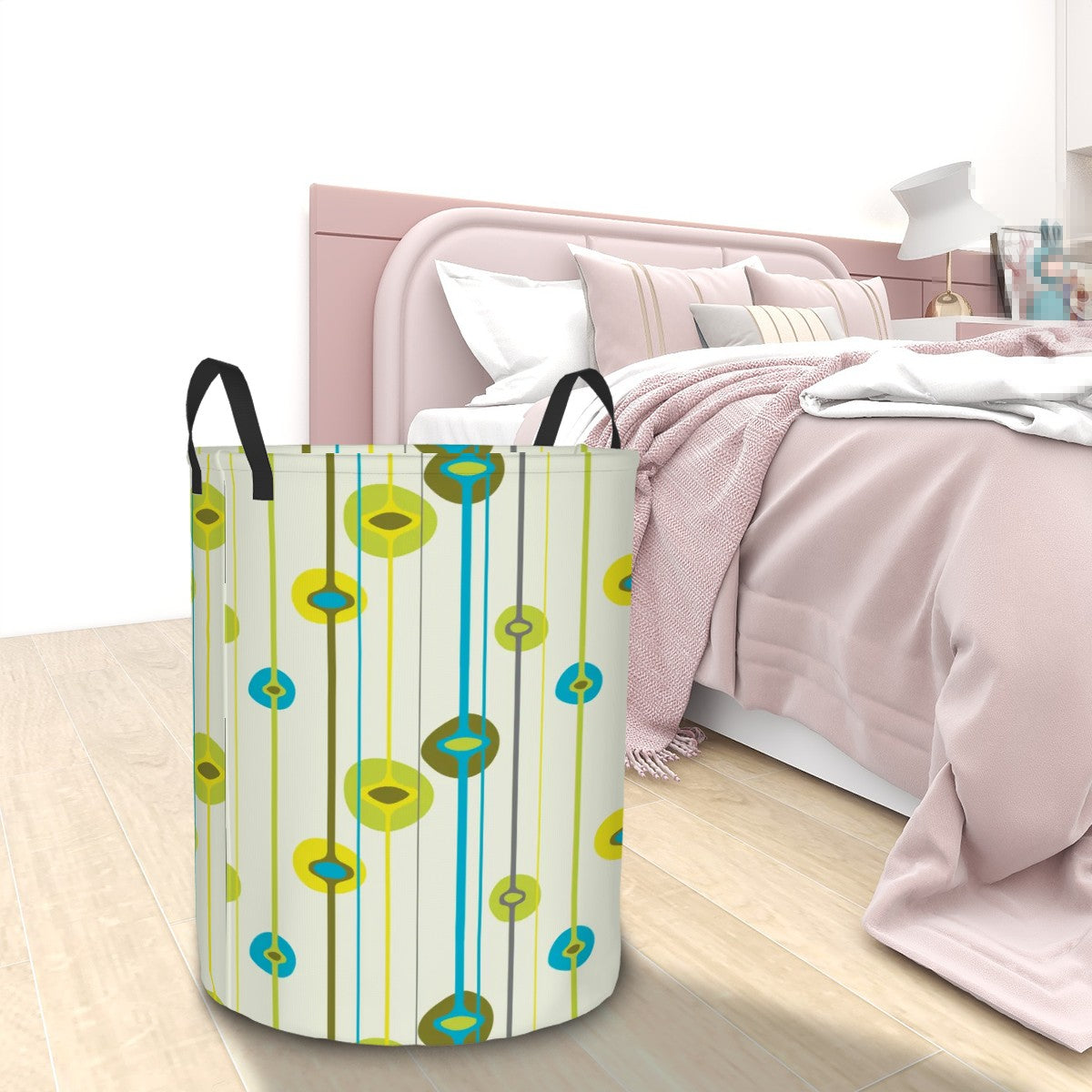 Retro patterned laundry basket on a wooden floor with a bed in the background