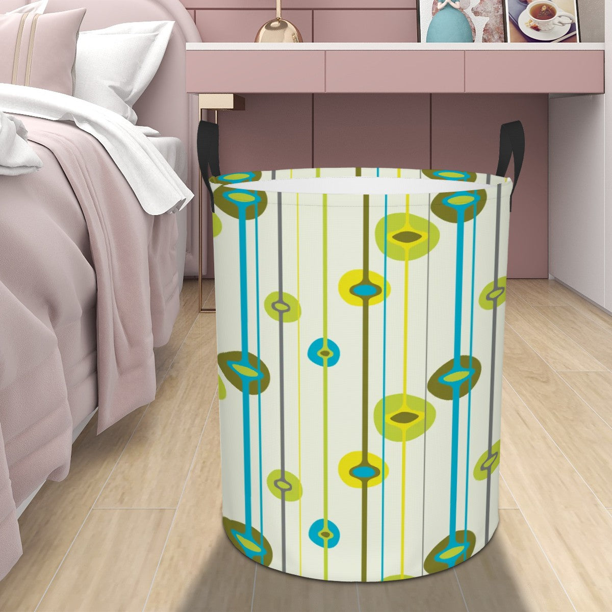 Patterned laundry basket on a wooden floor next to a bed